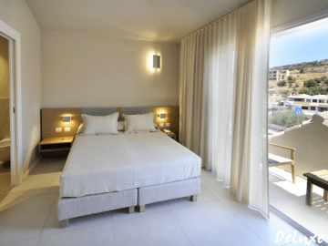 deluxe-rooms-domu-simius-villasimius-1.png